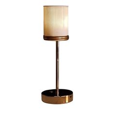 a table lamp with a white shade on it's base and a black stand