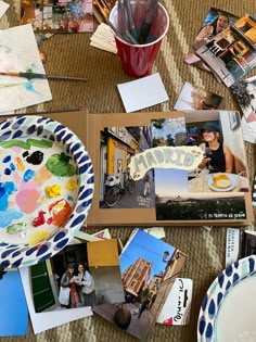 a table topped with pictures and other items