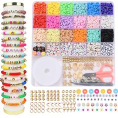 the beading kit is full of beads, scissors and other crafting supplies for making bracelets