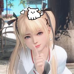 a girl with long blonde hair pointing at the camera and wearing a cat ears headband