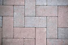 a close up view of a brick walkway