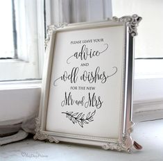 a white framed sign that says cards and gifts