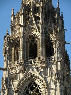 an old building with a clock on the front