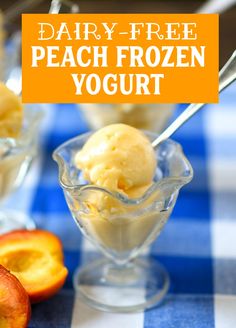 a bowl filled with ice cream next to sliced peaches on a blue and white checkered table cloth