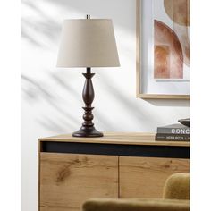 This 1 light Accent Table Lamp from the Kauri collection by Surya will enhance your home with a perfect mix of form and function. The features include a Dark Brown / Wood finish applied by experts.   Product Features Include: Brand: Surya  Collection: Kauri  SKU: KAU-001  UPC: 889292853408  Category: Table Lamp  Finish: Dark Brown / Wood  Material: Body Wood Veneer Base Wood Veneer Shade (Outside) Linen Shade (Inside) Polystyrene  Length: 12.00  in.  Width: 12.00  in.  Height: 21.50  in.  Backplate/Canopy Width: 0.00  in.  Backplate/Canopy Length: 0.00  in.  Weight: 2.09  lb.  Switch: On/Off on Cord  Bulbs Included: No  Primary Bulb(s): 1 x 60.00 watts E-26 Standard  Safety Rating: UL & CUL E483651 Dark Brown Bedside Table, Brown Wood Table, Bedside Table Brown, Dark Brown Table, Settee Dining, Outdoor Console Table, Wood Accent Table, Artwork Decor, Chest Coffee Table