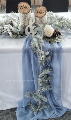 Head table décor.  Winter theme Woodsy Wedding Decor, Winter Wedding Arch, Ice Blue Weddings, Silver Winter Wedding, Blue Winter Wedding, Winter Wedding Centerpieces, Snowy Wedding