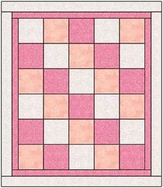 a pink and white quilt with squares on the front, in different shades of pink