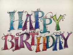 the words happy birthday are drawn in colored ink on white paper with black marker pens