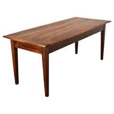 a wooden table sitting on top of a white background