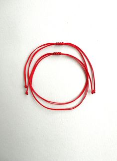 Red string couple bracelet Set of 2 bracelets Anniversary gift Kabbalah bracelet Red string of fate Protection bracelet Waxed cord bracelet This bracelet is made of two red 1mm thick waxed polyester string. It is adjustable to fit all sizes. *Colours may differ slightly from the original due to the configuration of your computer. *There may be light variations on colour and size. *Items appear larger on your monitor than actual size. Affordable Handmade Red Braided Bracelets, Cheap Customized Red Friendship Bracelets, Red Adjustable Friendship Jewelry, Red Adjustable Cord Friendship Jewelry, Red Adjustable Cord Jewelry For Friendship, Handmade Red Braided Bracelets With Nylon Cord, Handmade Red Jewelry With Waxed Cord, Red Waxed Cord Bracelet With Sliding Knot, Handmade Red Braided Nylon Cord Bracelets