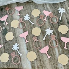 some pink and gold decorations on a table