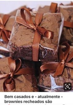 several pieces of brownie wrapped in orange ribbon