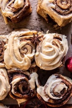 cinnamon rolls with icing and star anise on top