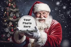 a santa clause holding up a photo with the message your photo here