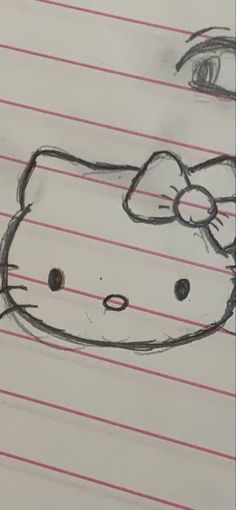 a drawing of a hello kitty on lined paper