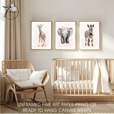 a baby's room with three framed art prints on the wall