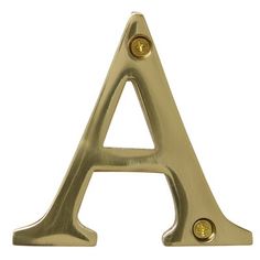 a gold metal letter with two screws on the bottom and one in the middle