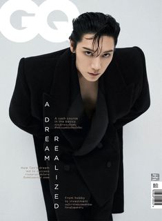 the cover of gq magazine features an image of a young man in a black suit