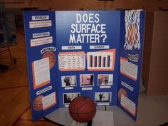 a display board with information about what does surface matter? and a basketball on it