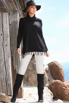 Fringe Cowl Turtleneck Poncho Sweater | A cozy cowl turtleneck tops this basic poncho sweater with drop shoulders on long sleeves and a split fringe hem. Split Fringe, Turtleneck Poncho, Belted Sweater, Tie Waist Top, Ruffle Jacket, Basic Sweaters, Knee Skirts