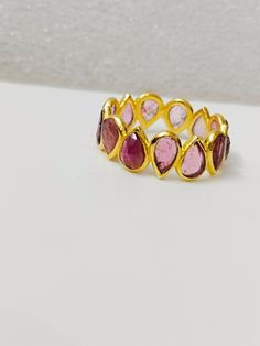 Natural pink Tourmaline Eternity Band 925 Sterling Silver - Handmade Ring- pink Gemstone Ring- 18k Gold flash ring Minimalist Ring Active PRODUCT DETAILS :- > Material - 925 Sterling Silver > Gemstone - pink Tourmaline > Gemstone Weight- 8.9 ct > Gemstone Size- 4.6 mm > Gemstone Shape- Oval > Gross Weight - 2.8 Grm > Setting - Bezel setting Handmade Pink tourmaline Band Ring Solid 925 Sterling Silver R Production Time: Each of our pieces are made to order. Due to this, it takes 3 to 5 business d Pink Ruby Open Ring With Gemstone, Adjustable Pink Gemstone Stackable Rings, Pink Gemstone Stackable Rings Fine Jewelry, Fine Jewelry Pink Stackable Rings With Gemstones, Pink Ruby Stackable Jewelry, Pink Sapphire Stackable Ring Gift, Pink Stackable Sapphire Ring Gift, Pink Sapphire Gemstone Stackable Rings, Pink Stackable Ruby Ring