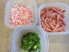 three plastic containers filled with different types of food