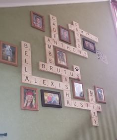 a wall filled with pictures and scrabble tiles that spell out the names of people