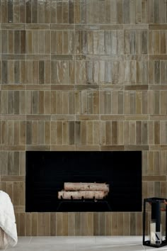 Fireplace Tile Inspiration Black Hexagon Fireplace Tile, Cool Tile Fireplace, Feature Wall Tiles Living Room, Tile Fireplace Pattern, Tiled Fireplace With Mantle, Floor To Ceiling Tiled Fireplace, Stacked Tile Fireplace, Red Brick Fireplace Ideas, Modern Tiled Fireplace