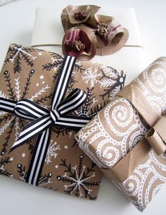 two wrapped presents sitting next to each other