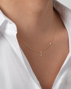 Beautifully handcrafted 14k gold pave diamond initial and a small bezel diamond on a dainty cable link chain necklace. Available in white, yellow and rose gold. This stunning piece will be you new favorite necklace! Wear it with your initial, or your loved one's. Made in L.A. Size of Initial: Approx. 8mm Diamond Bezel Carat Weight: Approx. 0.03 (ct. tw) Diamond Clarity: VS Diamond Initial Carat Weight: Approx. 0.11 (ct. tw) Ships in 4-9 business days Rush orders ship in 2-5 business days All per Bezel Necklace Diamond, Evil Eye Necklace Gold, Diamond Initial Necklace, Pretty Jewelry Necklaces, Double Chain Necklace, Gold Letter Necklace, Bezel Necklace, Initial Necklace Gold, Vs Diamond