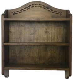 an old wooden bookcase with carvings on the top and bottom shelf, isolated against a white background