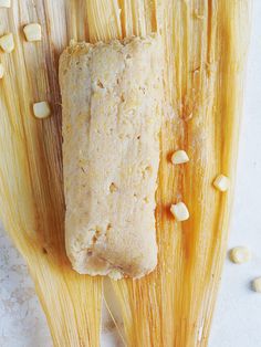 corn on the cob with some kind of bread