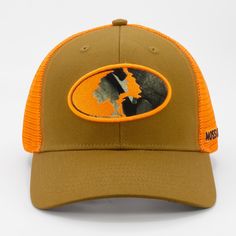 For the Mossy Oak hunter, this brown and blaze cap with the classic Mossy Oak oval is a must have.. The front panels are 100% cotton canvas paired with blaze orange premium mesh.. With an adjustable fit snapback closure and a structured crown that will keep its shape, this cap is both durable and comfortable.. Mossy Oak Men's Duck Brown/Blaze Cotton/Polyester Baseball Cap | MOK-0698-GS Mossy Oak, Baseball Cap, Cotton Canvas, Casual Outfits, Crown, Mesh, Baseball, Orange, Canvas