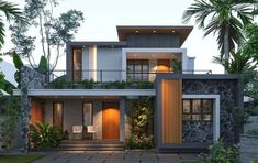 a modern house with lots of windows and plants on the front porch, surrounded by palm trees