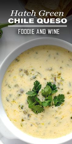 a white bowl filled with food and garnished with cilantro, parsley