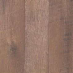 a close up view of the wood grains on this flooring material, which looks like it has been painted brown