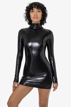 A super sexy mini dress made from shiny stretch vinyl. This glossy textile highlights your figure to give you a statement look. Features an elegant mock neckline, long sleeves with a mini length and is finished with a zipper down the back. Pair with thighs, thigh highs and more to complete your look. Made in Los Angeles, Calif. Our experienced sewers earn up to $25 an hour and no less than $16; additionally workers have healthcare benefits for less than $15 per week, a 401k plan, paid sick days, Black Latex Dress, Mockneck Dress, Vinyl Dress, Mock Neckline, Womens Black Dress, Dress Zipper, Types Of Dresses, Thigh Highs, Dress Making