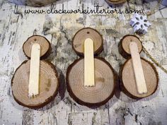 three pieces of wood are arranged in the shape of snowflakes and popsicles