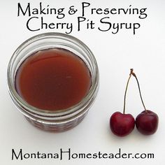 two cherries sitting next to a jar of cherry syrup with the words making & preserving cherry pit syrup