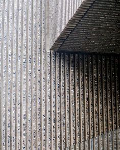 the side of a building that has metal slats on it