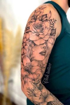 a woman with a flower tattoo on her arm