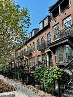 an apartment building with many balconies and windows