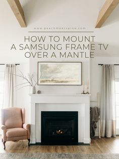 a living room with a fireplace, chair and painting on the wall above it that says how to mount a samsung frame tv over a mantle