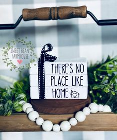 there's no place like home sign with beads