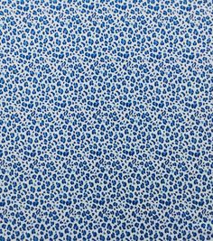 a blue and white background with small spots