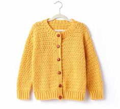 a yellow cardigan sweater hanging on a white hanger with the words, children's wear