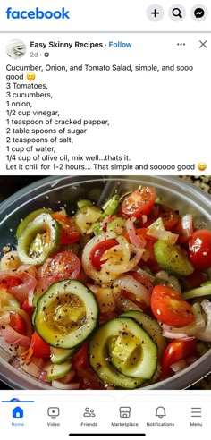 a bowl filled with cucumber, onion and tomato salad on top of a table