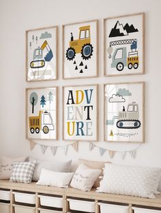 a set of four children's wall art prints on a white wall above a bench