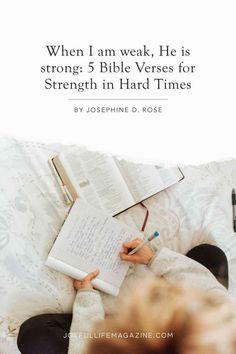 a woman sitting on top of a bed with an open book next to her and the words when i am weak, he is strong 5 bible verses for strength in hard times