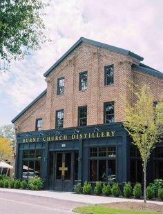 an old brick building with the words hart church distillerry on it's front